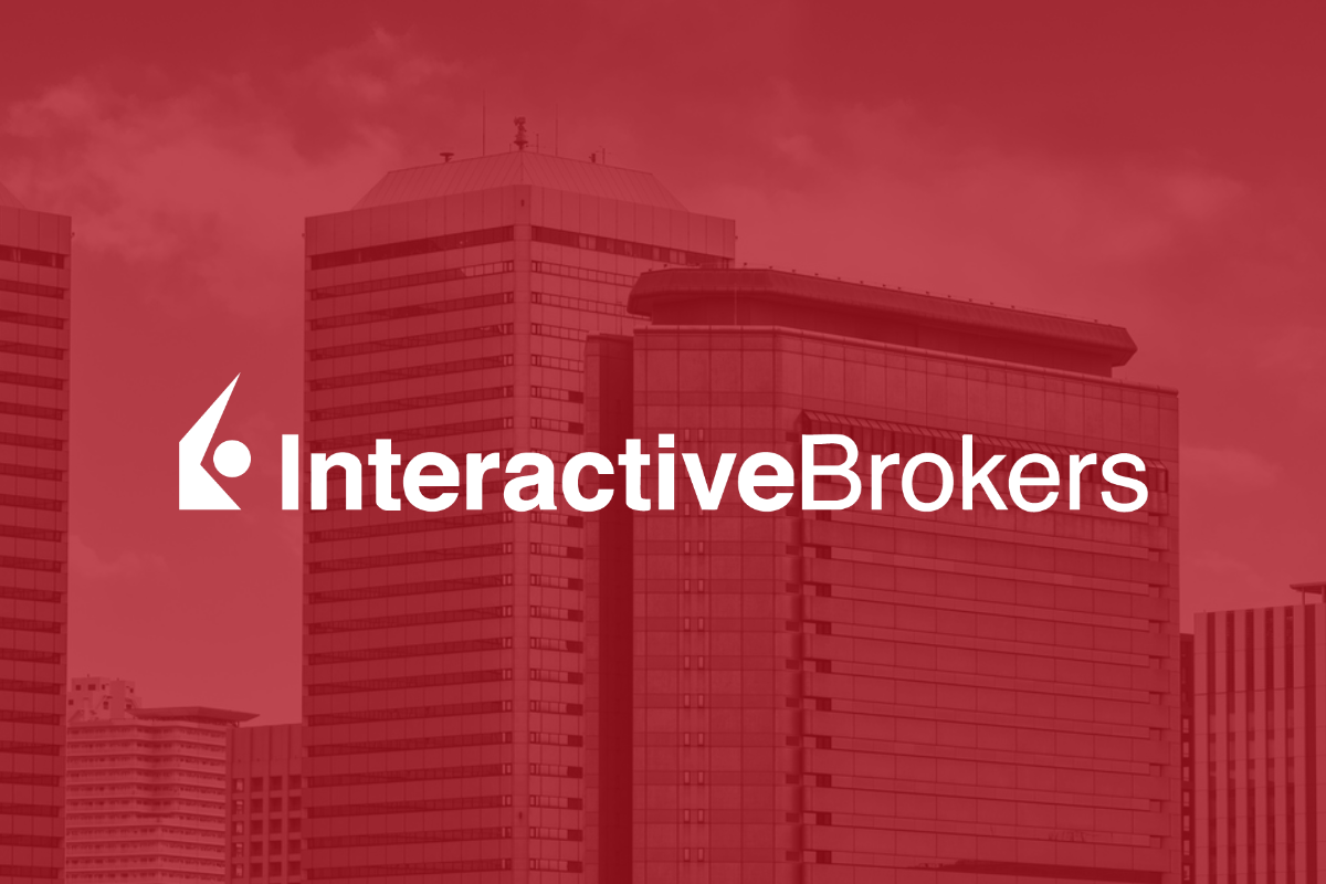 The Interactive Brokers logo over a red background superimposed over a picture of modern office buildings.