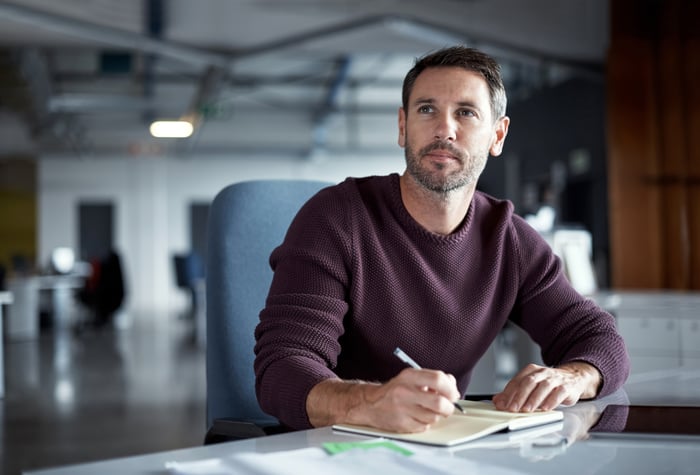 A person at a desk.