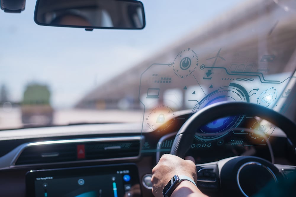 smart car driving graphic on windshield