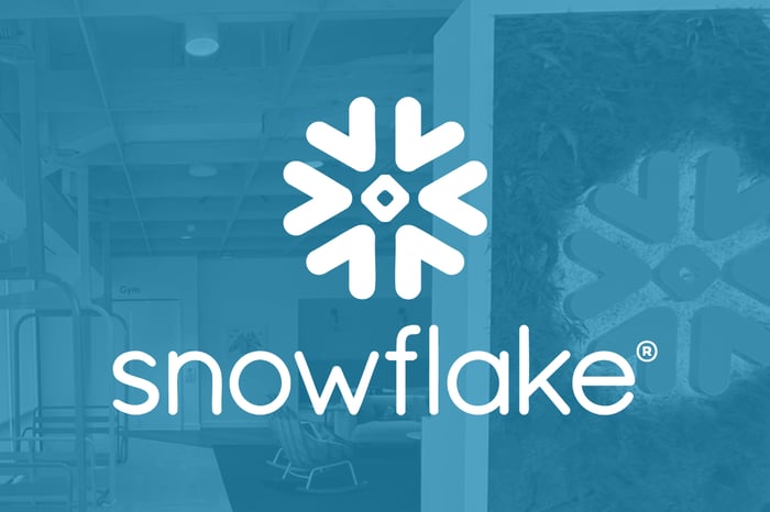 Snowflake logo against a light blue background.