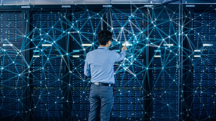 An IT professional works in a data center.