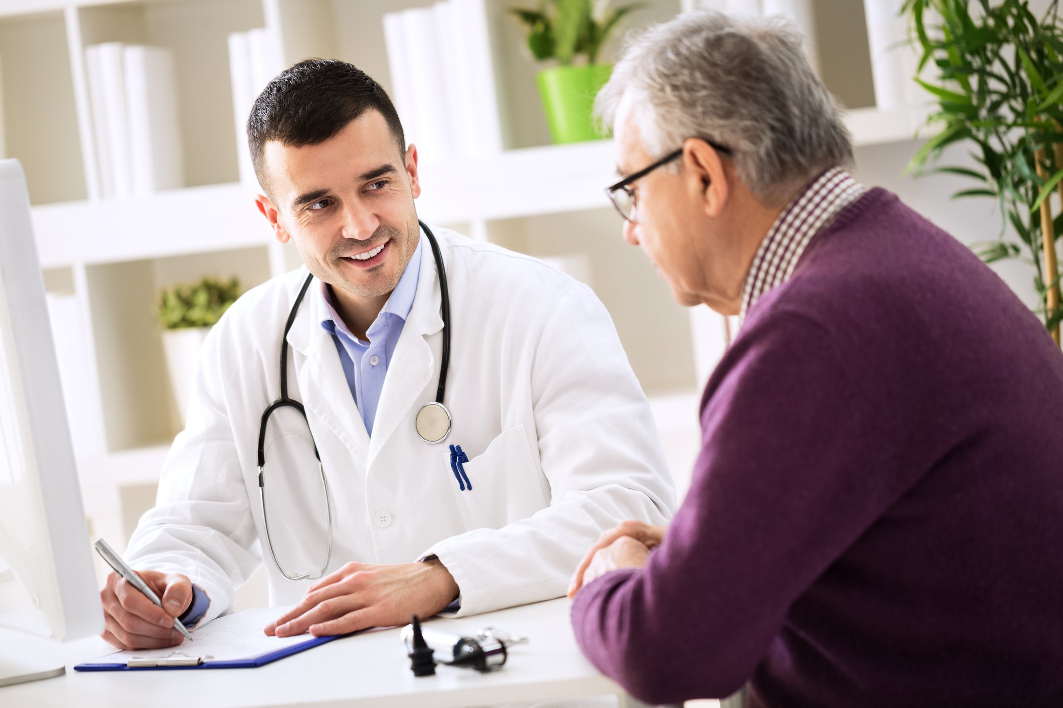 doctor talking to senior man -- patient medical medicine healthcare