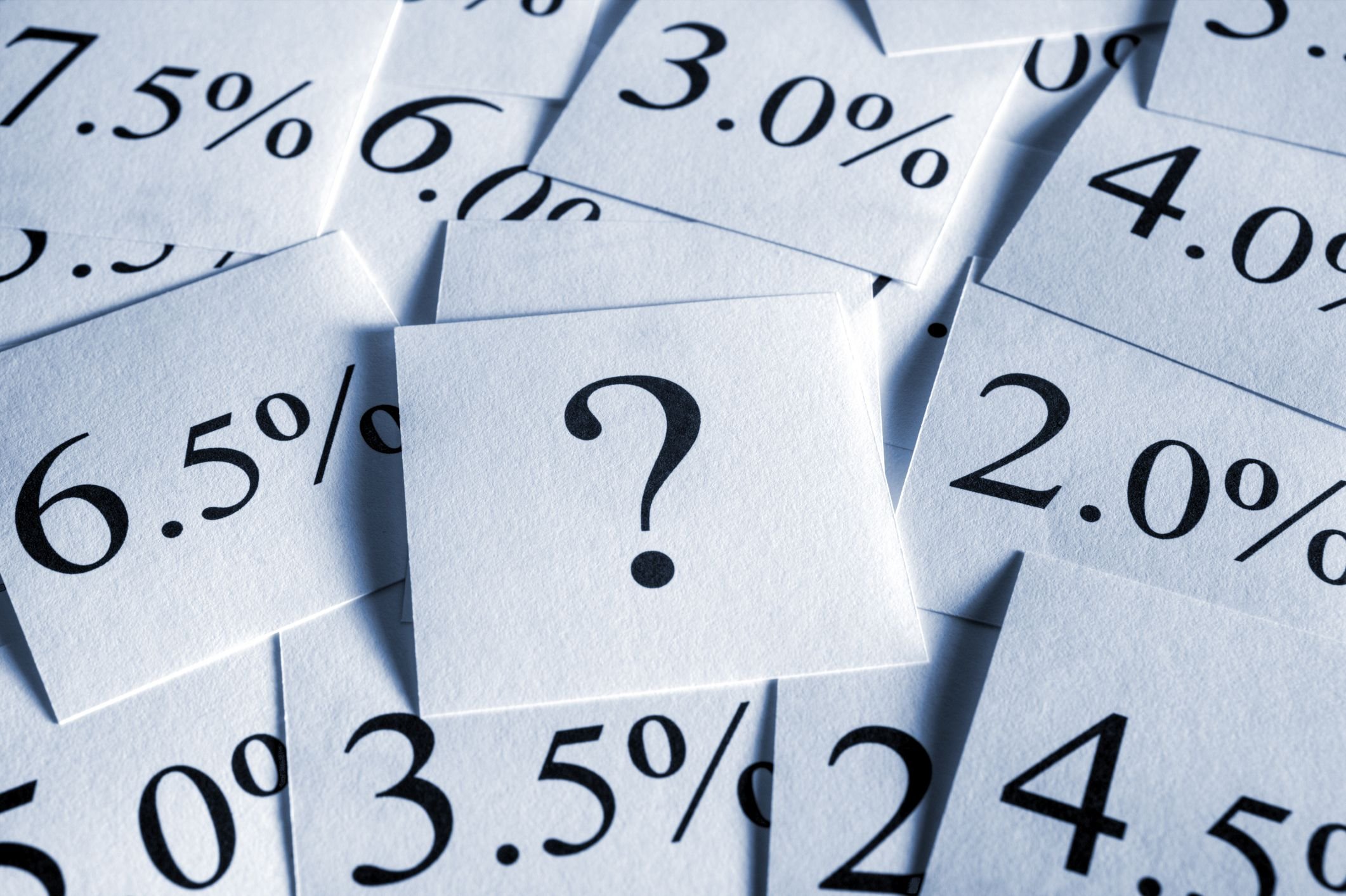 23_04_26 A pile of papers with percentages and one on top of the pile with a question mark _MF Dload
