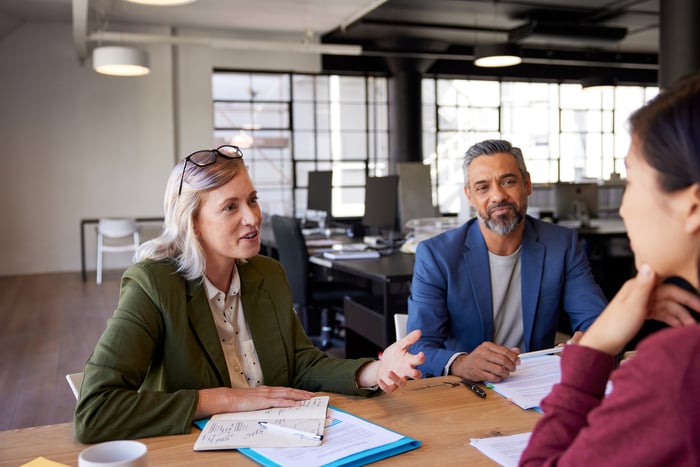 A client visiting their investment advisors.