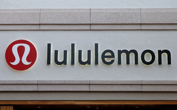 The lululemon logo sits on a building. 