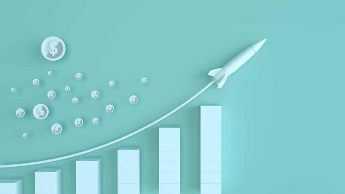 GettyImages-rocket bar graph dollar coins