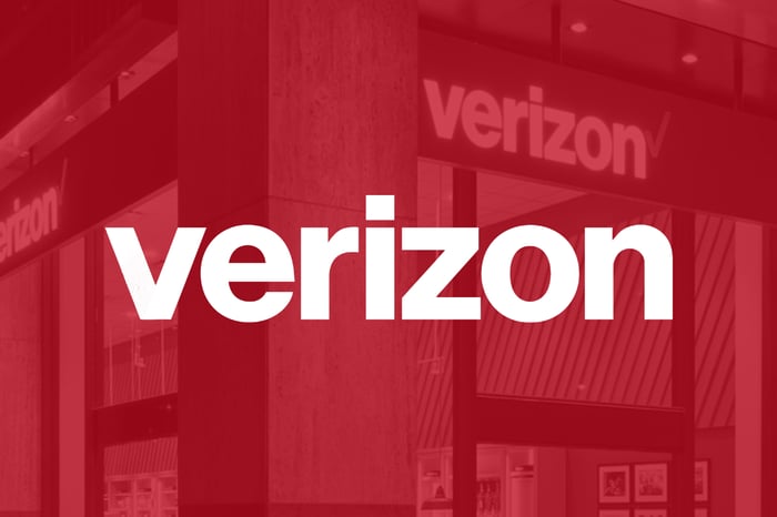 Verizon's logo on a red backdrop.