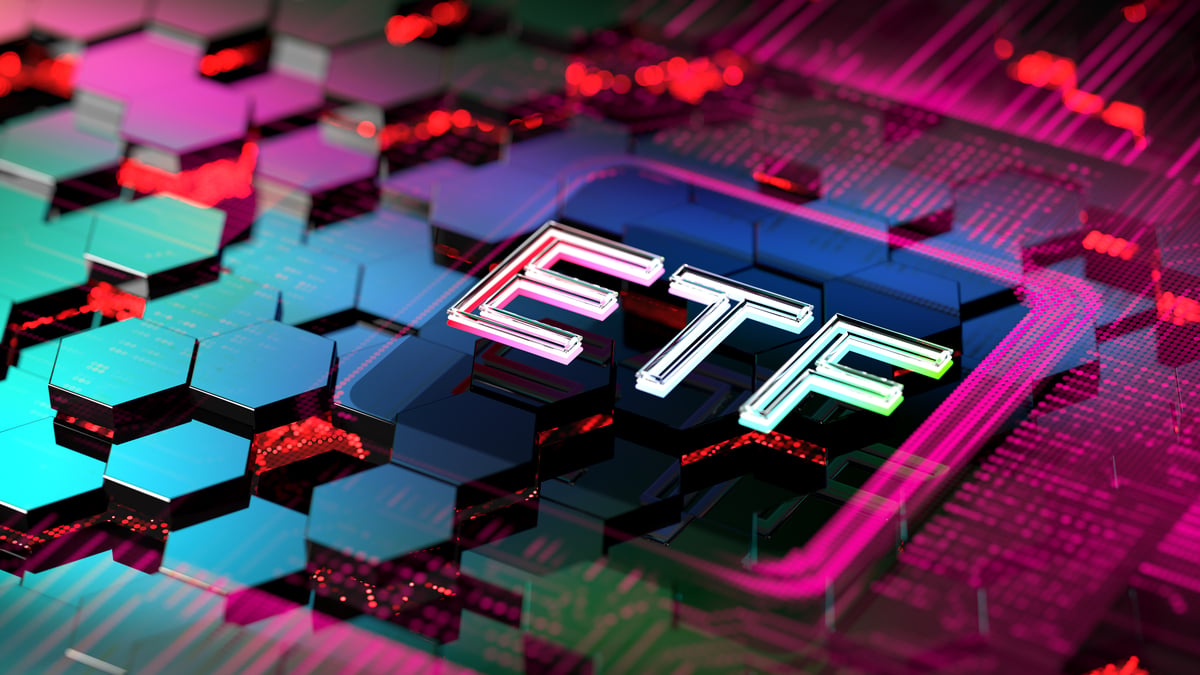 The letters “ETF” on circuit boards and hexagons, illustrating the advantages of using ETFs to invest in a basket of tech-focused stocks.