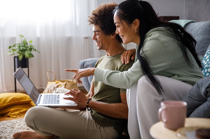 A confident couple of investors plan for their future with QQQ tech stock ETFs.