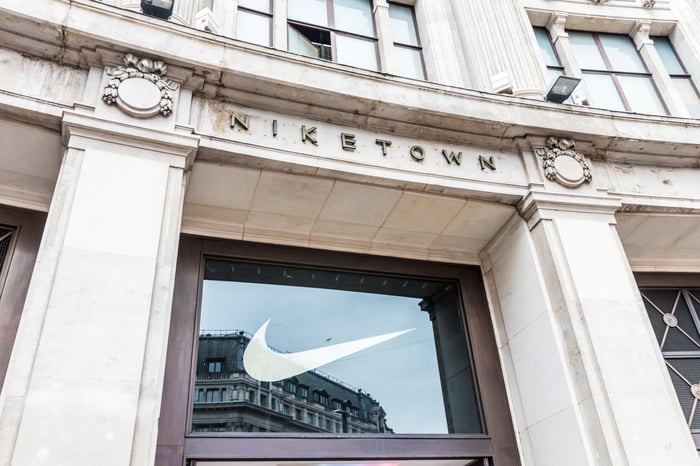 Nike's logo on a window.
