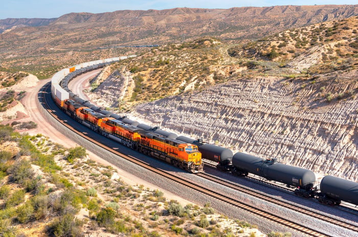 Two passing freight tracks on side-by-side tracks.