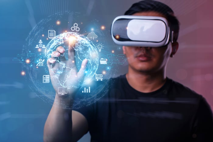 Person interacting with augmented reality.