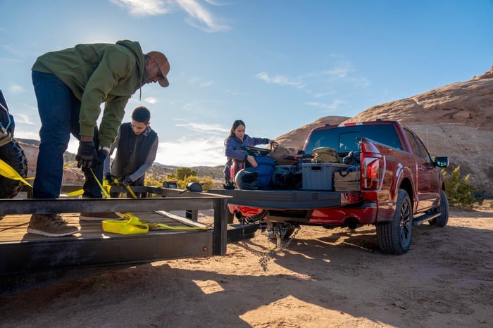 People with a Ford F-Series truck. 