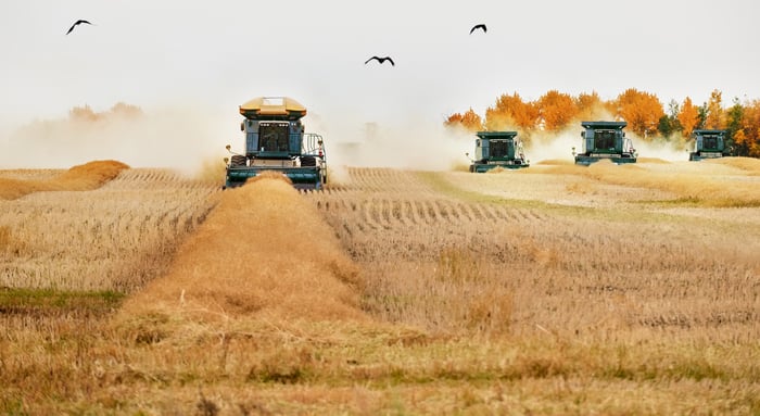 Large tractors in a field.