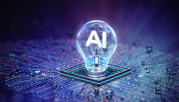 A chip with a light bulb on top labeled AI.