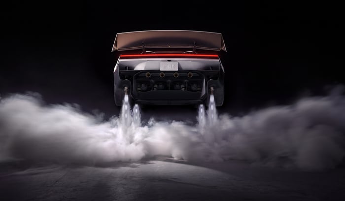 Tesla Roadster hovering in air.