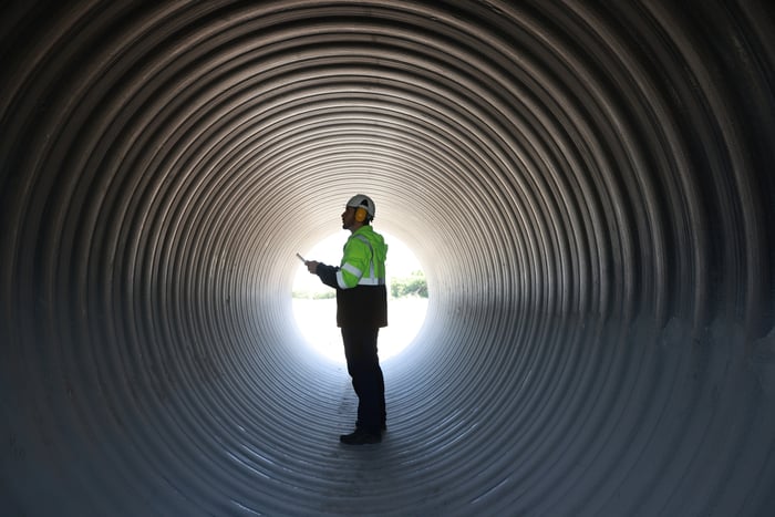 A person inside of a tunnel.