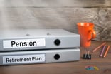 Binders reading Pension and Retirement Plan.