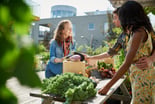Couple buying food at farmer's market