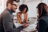 private_reits_three_people_having_a_meeting
