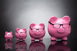 Getty - four piggy banks large small medium mid-cap.jpg