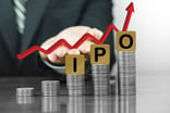 Arrow rising over the word IPO and coins.