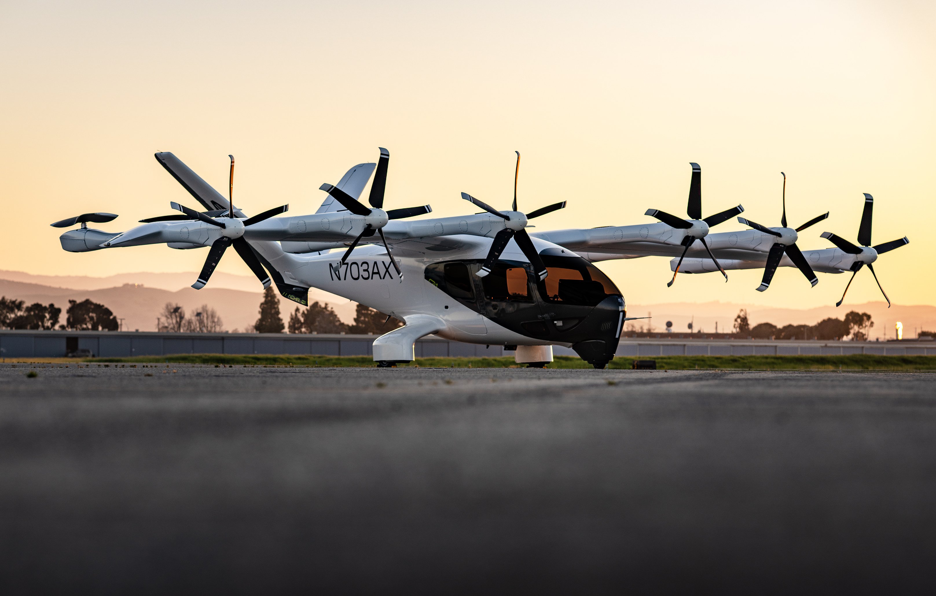 archer aviation evtol aircraft on tarmac at sunset N703AX