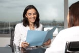 Two people in a meeting