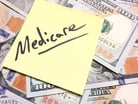 Medicare written on a Post-it note