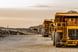 Mining trucks hauling mined materials.