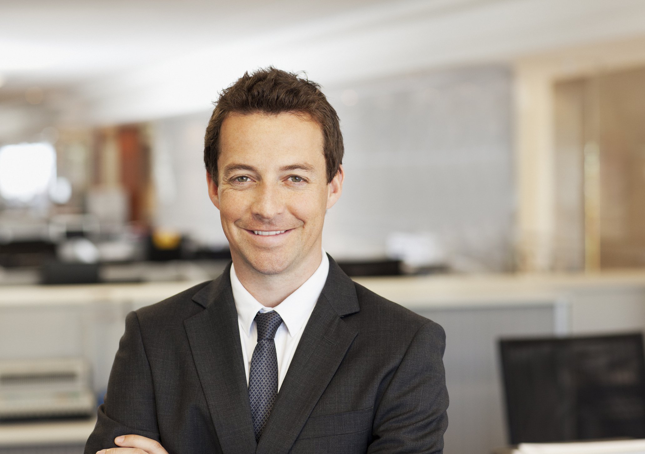 smiling man in suit
