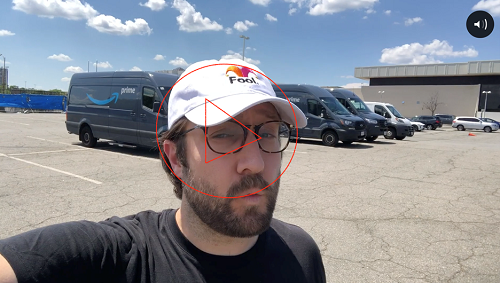 Image of Sam Barker overlayed by a play button